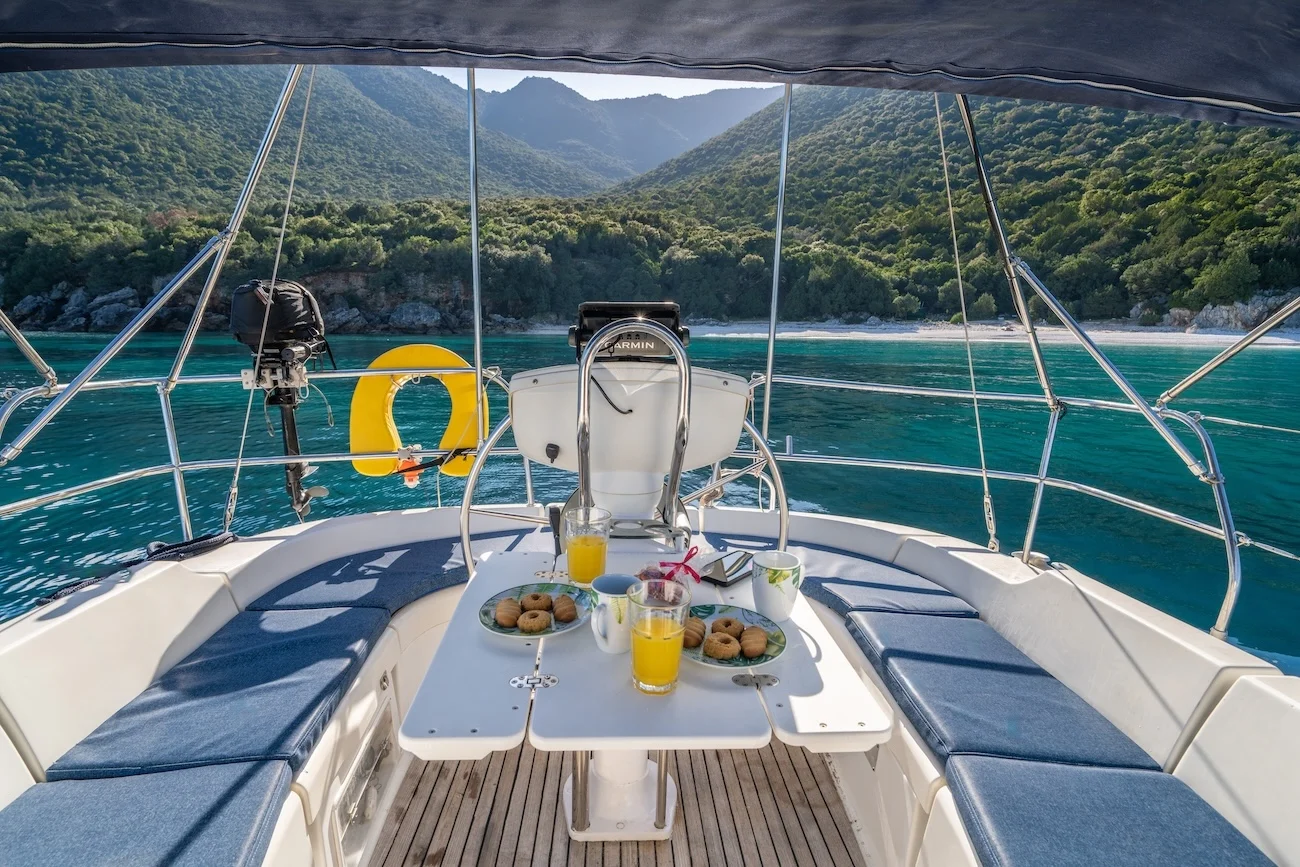 Luxury sailing yacht anchored in turquoise waters of Kefalonia